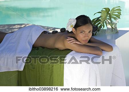 "Woman enjoying a wellness and spa treatment, South Africa, Africa" View Large Photo Image Stock Photograph - "Woman enjoying a wellness and spa treatment, South Africa, Africa". Fotosearch