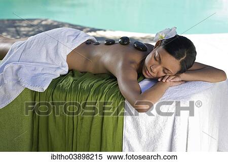 "Woman enjoying a wellness and spa treatment, South Africa, Africa" View Large Photo Image Stock Photography - "Woman enjoying a wellness and spa treatment, South Africa, Africa". Fotosearch
