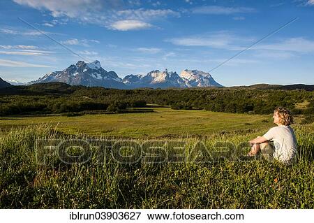 "Woman enjoying the view at Torres del Paine National Park, Patagonia, Chile, South America" View Large Photo Image Stock Photo - "Woman enjoying the view at Torres del Paine National Park, Patagonia, Chile, South America". Fotosearch