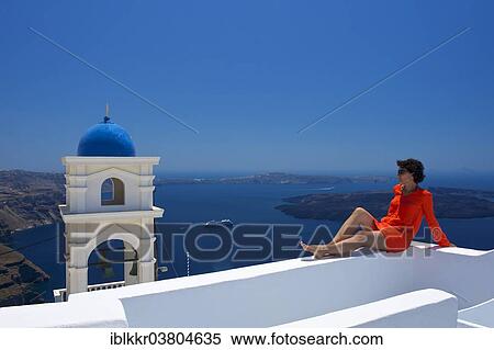 "Woman enjoying views of the Caldera, Imerovigli, Santorini, Cyclades, Greece, Europe" View Large Photo Image Stock Photography - "Woman enjoying views of the Caldera, Imerovigli, Santorini, Cyclades, Greece, Europe". Fotosearch