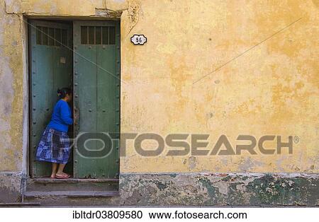 "Woman entering house, Old Havana, Havana, Cuba, North America" View Large Photo Image Stock Image - "Woman entering house, Old Havana, Havana, Cuba, North America". Fotosearch