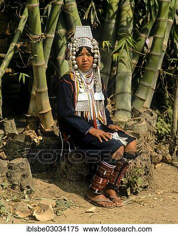 "Woman from the people of the Akha wearing traditional costume with a headdress, Tachilek, Shan State, Myanmar, Burma, Asia" View Large Photo Image Stock Photography - "Woman from the people of the Akha wearing traditional costume with a headdress, Tachilek, Shan State, Myanmar, Burma, Asia". Fotosearch