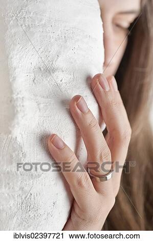 Woman hiding behind a mask View Large Photo Image Stock Image - Woman hiding behind a mask. Fotosearch