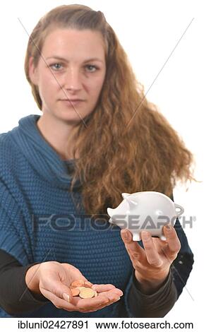 Woman holding euro coins and a piggy bank View Large Photo Image Stock Image - Woman holding euro coins and a piggy bank. Fotosearch