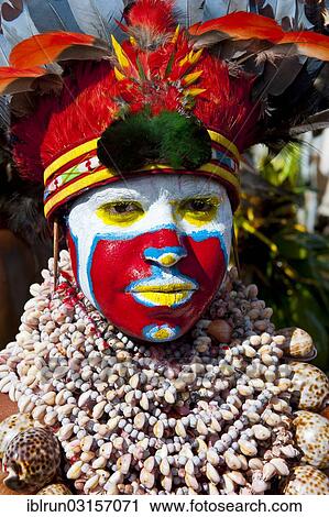 "Woman in a colourfully decorated costume with face paint at the traditional sing-sing gathering, Hochland, Mount Hagen, Western Highlands Province, Papua New Guinea, Oceania" View Large Photo Image Stock Image - "Woman in a colourfully decorated costume with face paint at the traditional sing-sing gathering, Hochland, Mount Hagen, Western Highlands Province, Papua New Guinea, Oceania". Fotosearch