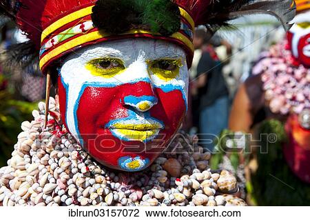 "Woman in a colourfully decorated costume with face paint at the traditional sing-sing gathering, Hochland, Mount Hagen, Western Highlands Province, Papua New Guinea, Oceania" View Large Photo Image Stock Image - "Woman in a colourfully decorated costume with face paint at the traditional sing-sing gathering, Hochland, Mount Hagen, Western Highlands Province, Papua New Guinea, Oceania". Fotosearch