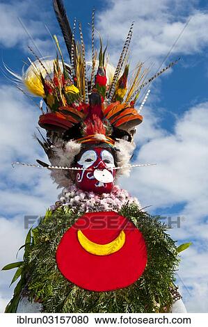 "Woman in a colourfully decorated costume with face paint at the traditional sing-sing gathering, Hochland, Mount Hagen, Western Highlands Province, Papua New Guinea, Oceania" View Large Photo Image Stock Image - "Woman in a colourfully decorated costume with face paint at the traditional sing-sing gathering, Hochland, Mount Hagen, Western Highlands Province, Papua New Guinea, Oceania". Fotosearch