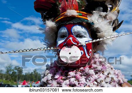 "Woman in a colourfully decorated costume with face paint at the traditional sing-sing gathering, Hochland, Mount Hagen, Western Highlands Province, Papua New Guinea, Oceania" View Large Photo Image Stock Image - "Woman in a colourfully decorated costume with face paint at the traditional sing-sing gathering, Hochland, Mount Hagen, Western Highlands Province, Papua New Guinea, Oceania". Fotosearch