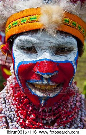 "Woman in a colourfully decorated costume with face paint at the traditional sing-sing gathering, Hochland, Mount Hagen, Western Highlands Province, Papua New Guinea, Oceania" View Large Photo Image Stock Photograph - "Woman in a colourfully decorated costume with face paint at the traditional sing-sing gathering, Hochland, Mount Hagen, Western Highlands Province, Papua New Guinea, Oceania". Fotosearch