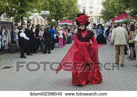 "Woman in a red and black costume with a mask taking part in the artist's procession, Venetian Fair, Ludwigsburg, Baden-Wuerttemberg, Germany, Europe" View Large Photo Image Stock Photography - "Woman in a red and black costume with a mask taking part in the artist's procession, Venetian Fair, Ludwigsburg, Baden-Wuerttemberg, Germany, Europe". Fotosearch