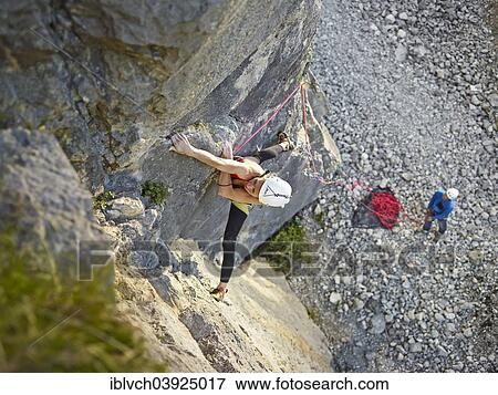 "Woman lead climbing a ledge, Martinswand climbing area, Zirl, Tyrol, Austria, Europe" View Large Photo Image Stock Photo - "Woman lead climbing a ledge, Martinswand climbing area, Zirl, Tyrol, Austria, Europe". Fotosearch