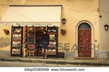 "Woman looking into a Brunello di Montalcino wine shop, Montalcino, Tuscany, Italy, Europe" View Large Photo Image Stock Photo - "Woman looking into a Brunello di Montalcino wine shop, Montalcino, Tuscany, Italy, Europe". Fotosearch