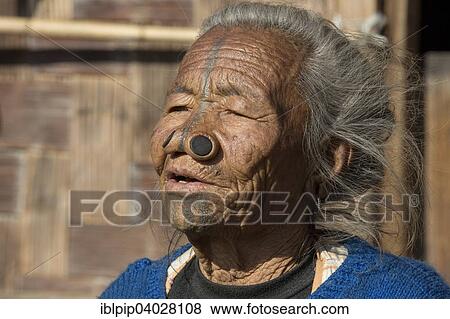 "Woman of the Apatani people, with nose plugs, Hapoli, Arunachal Pradesh, India, Asia" View Large Photo Image Stock Photo - "Woman of the Apatani people, with nose plugs, Hapoli, Arunachal Pradesh, India, Asia". Fotosearch