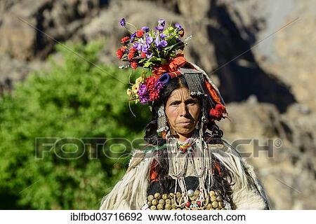 "Woman of the Brokpa tribe wearing traditional dress with flower headdress, Dah, Ladakh, Jammu and Kashmir, India, Asia" View Large Photo Image Stock Image - "Woman of the Brokpa tribe wearing traditional dress with flower headdress, Dah, Ladakh, Jammu and Kashmir, India, Asia". Fotosearch