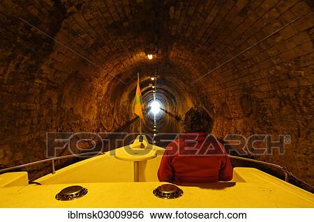 "Woman on a houseboat on the Saone, in the tunnel of Saint-Albin, 680 metres, Scey-sur-Saone, Vesoul, Haute-Saone, Franche-Comte, France, Europe" View Large Photo Image Stock Photograph - "Woman on a houseboat on the Saone, in the tunnel of Saint-Albin, 680 metres, Scey-sur-Saone, Vesoul, Haute-Saone, Franche-Comte, France, Europe". Fotosearch
