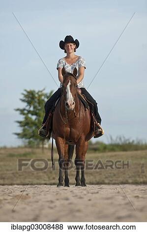 Stock Photo - "Woman on a Quarter Horse, Germany, Europe". Fotosearch
