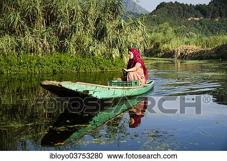 "Woman on a shikara, a traditional boat, on Lake Dal, Srinagar, Jammu and Kashmir, India, Asia" View Large Photo Image Stock Image - "Woman on a shikara, a traditional boat, on Lake Dal, Srinagar, Jammu and Kashmir, India, Asia". Fotosearch