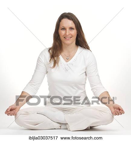 Woman practicing yoga View Large Photo Image Stock Photo - Woman practicing yoga. Fotosearch