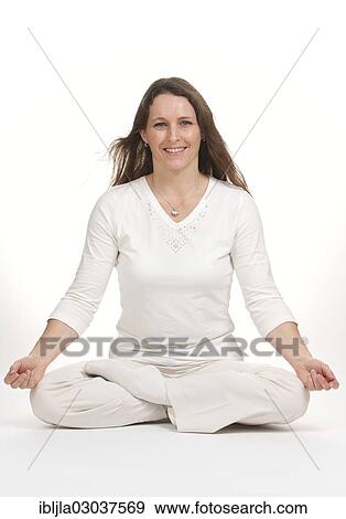 Woman practicing yoga View Large Photo Image Stock Photo - Woman practicing yoga. Fotosearch
