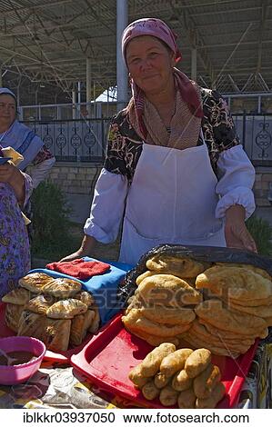 "Woman selling baked goods, Central Bazaar, Samarkand, Uzbekistan, Asia" View Large Photo Image Stock Image - "Woman selling baked goods, Central Bazaar, Samarkand, Uzbekistan, Asia". Fotosearch