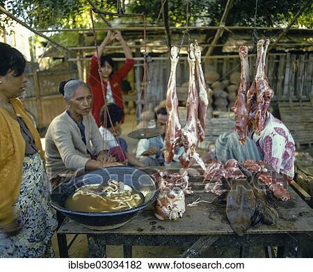 "Woman selling meat at a market, Taunggyi, Shan State, Myanmar, Burma, Asia" View Large Photo Image Stock Image - "Woman selling meat at a market, Taunggyi, Shan State, Myanmar, Burma, Asia". Fotosearch