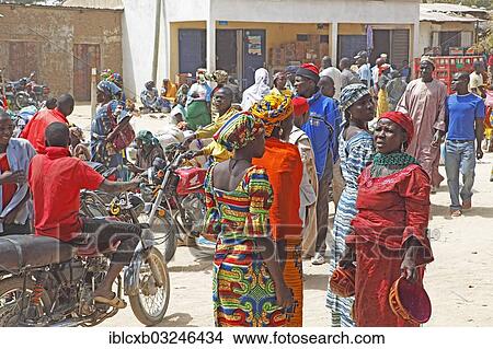 "Woman selling typical gourd helmets at a market, Tourou, Far North, Cameroon, Africa" View Large Photo Image Picture - "Woman selling typical gourd helmets at a market, Tourou, Far North, Cameroon, Africa". Fotosearch