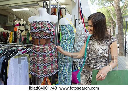 "Woman shopping, Jesolo, Veneto, Italy, Europe" View Large Photo Image Stock Image - "Woman shopping, Jesolo, Veneto, Italy, Europe". Fotosearch