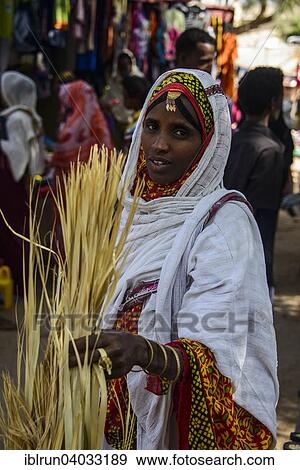 "Woman shopping on the colourful Monday market of Keren, Eritrea, Africa" View Large Photo Image Stock Photo - "Woman shopping on the colourful Monday market of Keren, Eritrea, Africa". Fotosearch