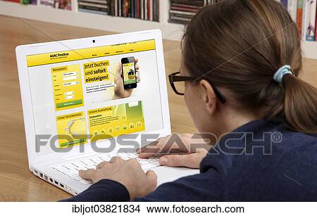 "Woman sitting at a laptop surfing the internet, website of ADAC Postbus" View Large Photo Image Picture - "Woman sitting at a laptop surfing the internet, website of ADAC Postbus". Fotosearch