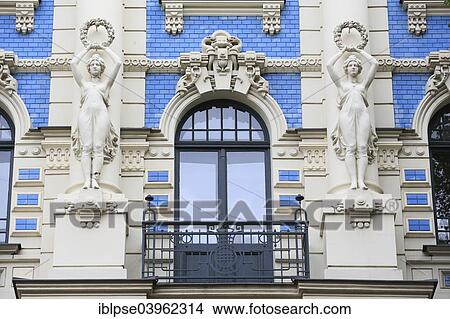 "Woman statues holding wreaths, Art Nouveau facade of the house Strelnieku iela 12, architect Mikhail Eisenstein, Riga, Latvia, Europe" View Large Photo Image Picture - "Woman statues holding wreaths, Art Nouveau facade of the house Strelnieku iela 12, architect Mikhail Eisenstein, Riga, Latvia, Europe". Fotosearch
