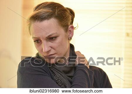 Woman suffering neck pain View Large Photo Image Stock Image - Woman suffering neck pain. Fotosearch