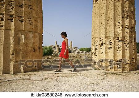 "Woman walking between columns of Temple E, Temple of Hera, Selinunt, Trabant, Sizilien, Italy, Europe" View Large Photo Image Stock Photograph - "Woman walking between columns of Temple E, Temple of Hera, Selinunt, Trabant, Sizilien, Italy, Europe". Fotosearch