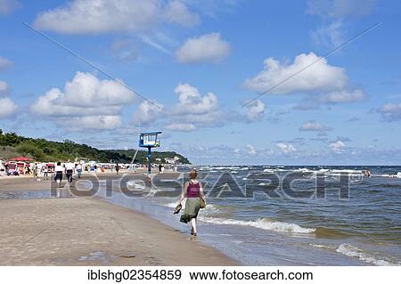 "Woman walking on the beach, Bansin, Usedom Island, Mecklenburg-Western Pomerania, Germany, Europe" View Large Photo Image Stock Photo - "Woman walking on the beach, Bansin, Usedom Island, Mecklenburg-Western Pomerania, Germany, Europe". Fotosearch