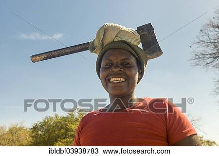 "Woman wearing ax on her head, Thohoyandou, Venda, Vhembe District, Limpopo Province, South Africa, Africa" View Large Photo Image Stock Image - "Woman wearing ax on her head, Thohoyandou, Venda, Vhembe District, Limpopo Province, South Africa, Africa". Fotosearch