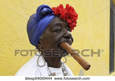 Picture - "Woman with a cigar, Havana, Ciudad de La Habana, Cuba, North America". Fotosearch