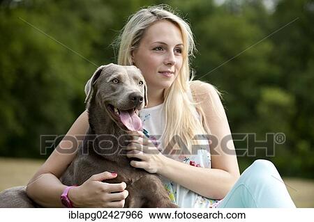 Woman with a Labrador Retriever View Large Photo Image Stock Photograph - Woman with a Labrador Retriever. Fotosearch