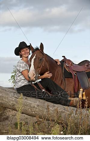 Picture - "Woman with a Quarter Horse, Germany, Europe". Fotosearch