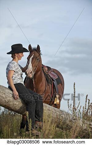 Stock Photograph - "Woman with a Quarter Horse, Germany, Europe". Fotosearch
