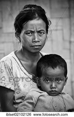 "Woman with child, portrait, Laos, Southeast Asia, Asia" View Large Photo Image Stock Photograph - "Woman with child, portrait, Laos, Southeast Asia, Asia". Fotosearch