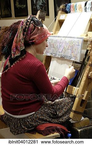 "Woman working in a carpet factory, Cappadocia, Central Anatolia, Turkey, Asia" View Large Photo Image Stock Image - "Woman working in a carpet factory, Cappadocia, Central Anatolia, Turkey, Asia". Fotosearch