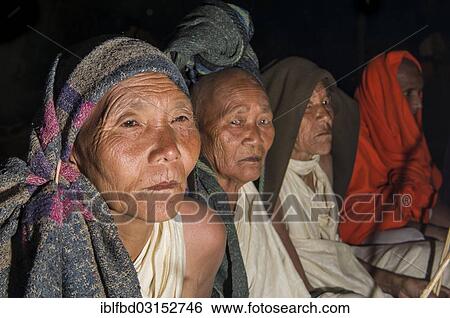 Stock Photograph - "Women during the initiation of new Jain nuns, during Kumbha Mela festival, at night, Allahabad, Uttar Pradesh, India, Asia". Fotosearch