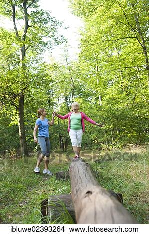 Women exercising on an outdoor fitness trail View Large Photo Image Picture - Women exercising on an outdoor fitness trail. Fotosearch