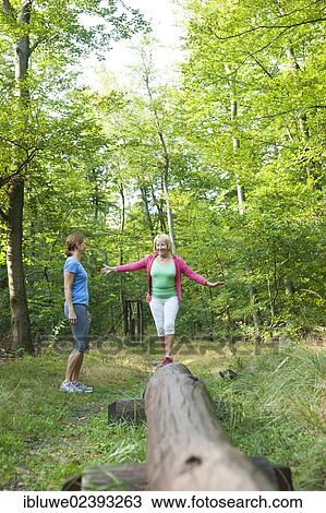 Women exercising on an outdoor fitness trail View Large Photo Image Stock Image - Women exercising on an outdoor fitness trail. Fotosearch