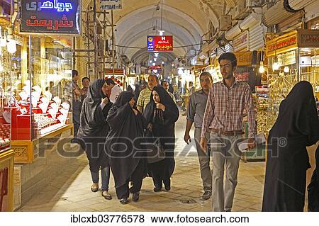 "Women in chadors in the bazaar, Yazd, Yazd Province, Persia, Iran, Asia" View Large Photo Image Stock Photo - "Women in chadors in the bazaar, Yazd, Yazd Province, Persia, Iran, Asia". Fotosearch