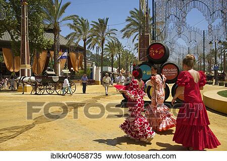 "Women in flamenco dresses at the Feria del Caballo, Jerez de la Frontera, Andalusia, Spain, Europe" View Large Photo Image Stock Photography - "Women in flamenco dresses at the Feria del Caballo, Jerez de la Frontera, Andalusia, Spain, Europe". Fotosearch