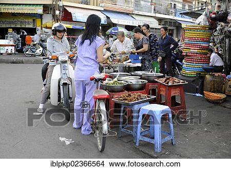 "Women shopping at a street market in Phnom Penh, Cambodia, Asia" View Large Photo Image Picture - "Women shopping at a street market in Phnom Penh, Cambodia, Asia". Fotosearch