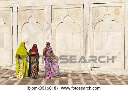 "Women wearing colourful saris, Taj Mahal, mausoleum, UNESCO World Heritage Site, Agra, Uttar Pradesh, India, Asia" View Large Photo Image Stock Photo - "Women wearing colourful saris, Taj Mahal, mausoleum, UNESCO World Heritage Site, Agra, Uttar Pradesh, India, Asia". Fotosearch