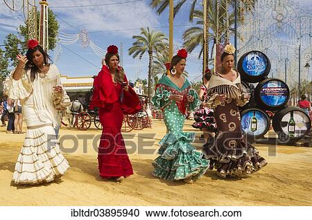 "Women wearing gypsy dresses at the Feria del Caballo, Jerez de la Frontera, Cadiz province, Andalusia, Spain, Europe" View Large Photo Image Stock Image - "Women wearing gypsy dresses at the Feria del Caballo, Jerez de la Frontera, Cadiz province, Andalusia, Spain, Europe". Fotosearch