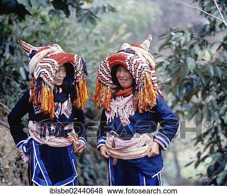 Stock Photo - "Women wearing traditional dress, mountain people, minority in China, Asia". Fotosearch