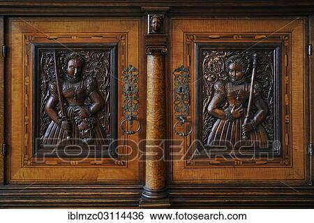 "Wood carved reliefs in a cabinet from about 1535, after a design by Peter Floetner, in Tucher Mansion, Hirschelgasse 9-11, Nuremberg, Middle Franconia, Bavaria, Germany, Europe" View Large Photo Image Stock Photograph - "Wood carved reliefs in a cabinet from about 1535, after a design by Peter Floetner, in Tucher Mansion, Hirschelgasse 9-11, Nuremberg, Middle Franconia, Bavaria, Germany, Europe". Fotosearch